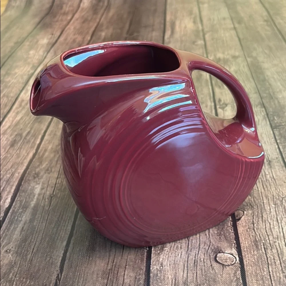 Unmarked Fiesta style Burgundy Disc Pitcher